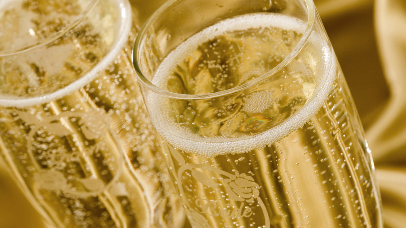 Champagne filled wedding glasses